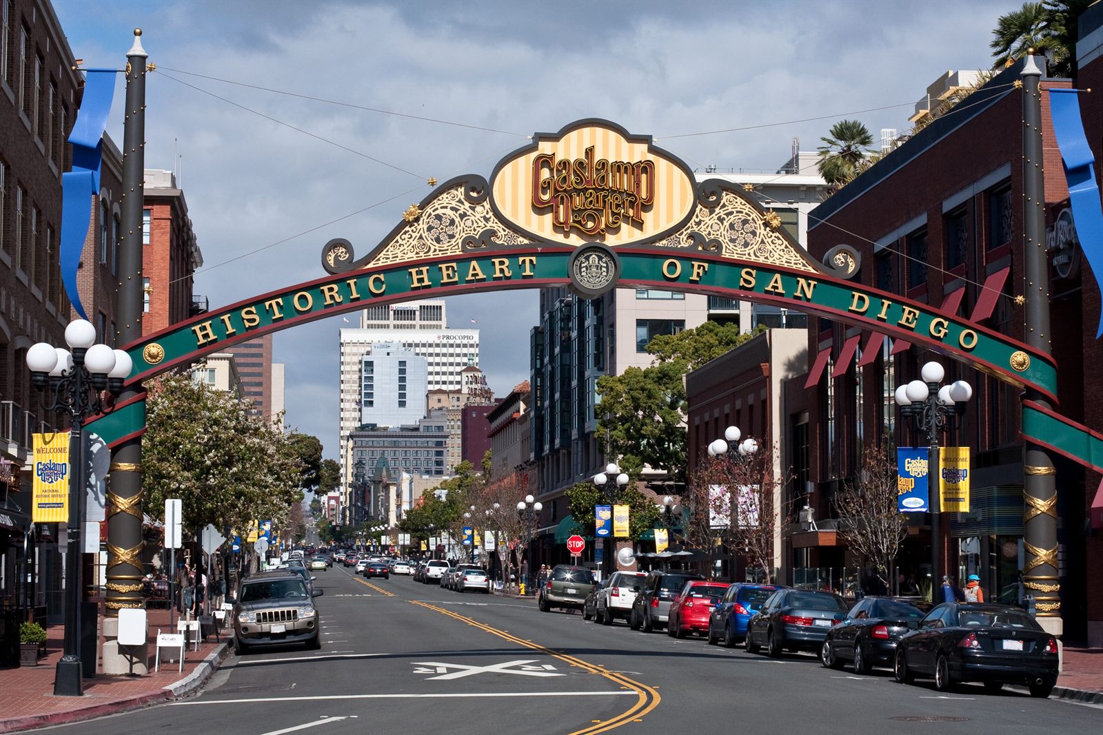 Arched Gaslamp Quarter sign over a downtown San Diego street, a destination advisors follow in travel agent news