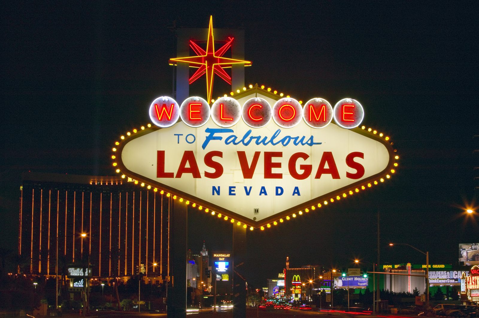 The Welcome to Fabulous Las Vegas sign lit up at night, a symbol of U.S. travel demand when asking is the travel industry growing